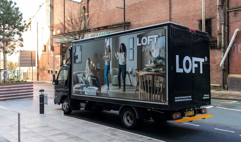 LOFT delivery vehicle outside a building