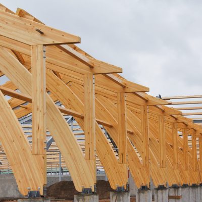 Roof construction of laminated veneer lumber. Building. Glued laminated timber.