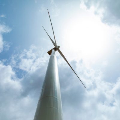 Windmill against blue skies - silhouette